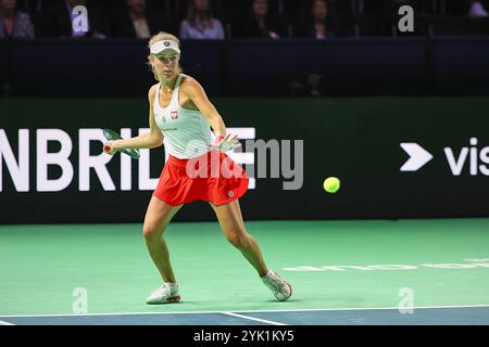 Malaga, Malaga, Spain. 16th Nov, 2024. Magdalena Frech of Poland, returns with forehand against Marie Bouzkova of Czechia during the 2024 Billie Jean King Cup Finals - Womens Tennis (Credit Image: © Mathias Schulz/ZUMA Press Wire) EDITORIAL USAGE ONLY! Not for Commercial USAGE! Stock Photo