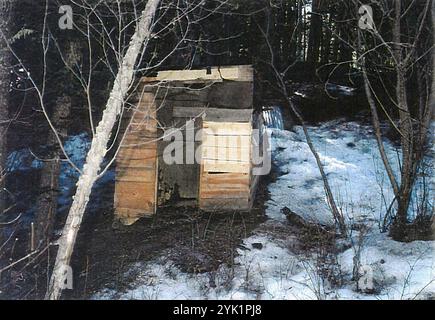 A structure identified by the FBI as a firewood shed, but often referred to as a root cellar, is shown in this 1996 evidence photo. The structure was still standing as of 2016, but is surrounded by a barbed wire fence and has a no trespassing sign attached to it. Stock Photo
