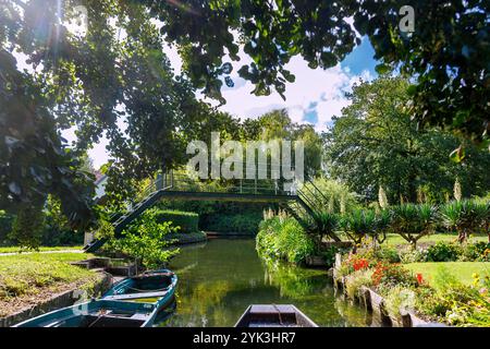 Hortillonnages (floating gardens) with boats for boat tours through the water labyrinth of allotment gardens in Amiens in the Somme department in the Stock Photo