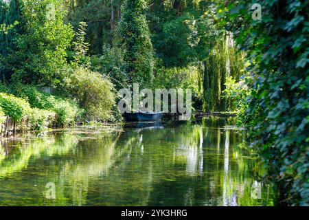 Hortillonnages (floating gardens), boat tour through the water labyrinth of allotment gardens in Amiens in the Somme department in the Hauts-de-France Stock Photo