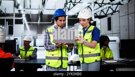 Factory Worker Osha Inspection Using Laptop Computer Stock Photo