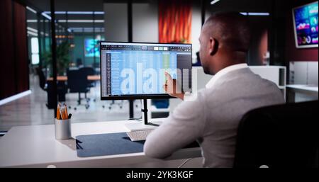 Business Data Audit Spreadsheet On Analyst Computer Stock Photo