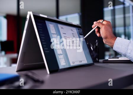E Invoice Business Management. Accountant Using Electronic Invoice Stock Photo