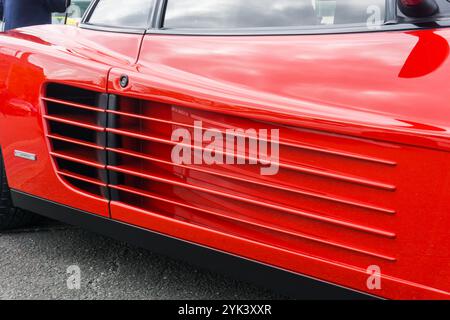 Close up detail of the side strake air intakes on a rosso corsa red ...