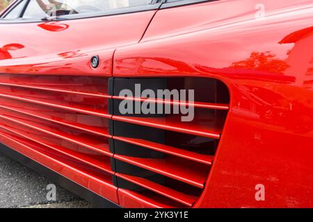 Close up detail of the side strake air intakes on a rosso corsa red ...