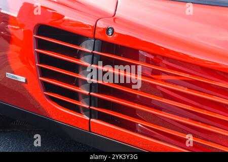 Close up detail of the side strake air intakes on a rosso corsa red ...