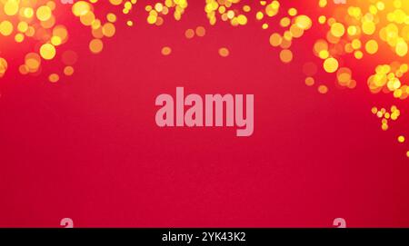 Blurred golden christmas lights as a frame on red festive christmas background. Stock Photo