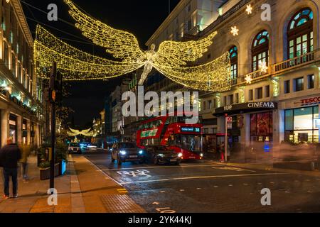 LONDON - NOVEMBER 15, 2024: Christmas lights on Regents Street St James. Beautiful Christmas decorations attract thousands of shoppers during the fest Stock Photo