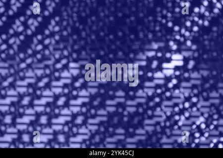 Defocused abstract bokeh background pink purple colored, flare from lights, blurred round bokeh as holiday, celebration wallpaper. Glittering textured Stock Photo