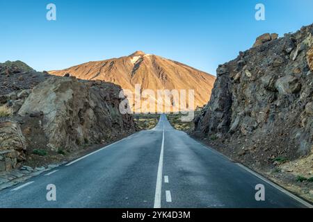 Asphalt road leading towards the Teide volcano landscape in Tenerife, Canary Islands, Spain. Stock Photo