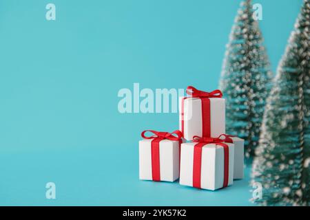 Stacks of Christmas gifts under the tree Stock Photo
