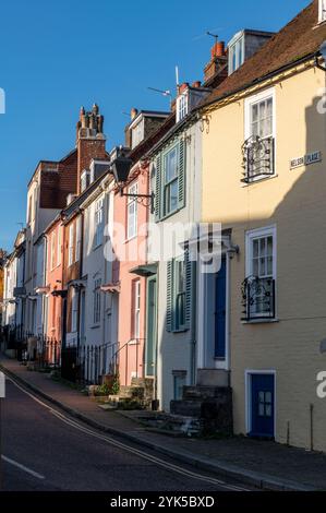 row or terrace of period colourful cottages in the seaside and harbour town of Lymington in the New Forest, Hampshire, UK Stock Photo