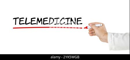 Hand with pen writing Telemedicine Stock Photo