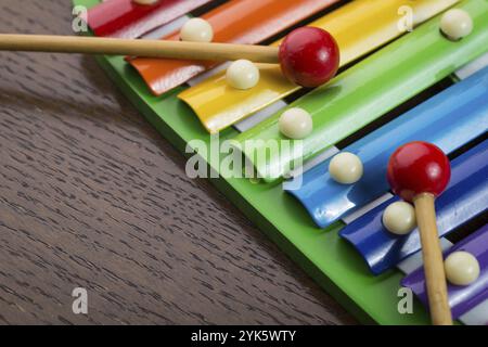 Rainbow colored toy xylophone Stock Photo