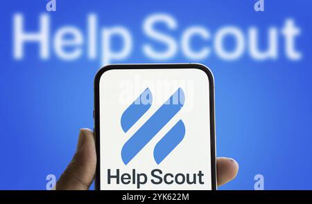 Help Scout logo is displayed on smartphone. Help Scout PBC is a global ...