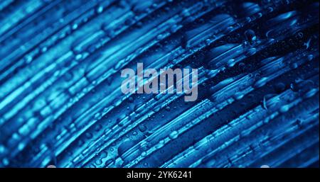 Blur overflow. Blue drops. Clean water spill over striped grooved surface. Moister refreshing bright ribbed macro wet texture. Stock Photo