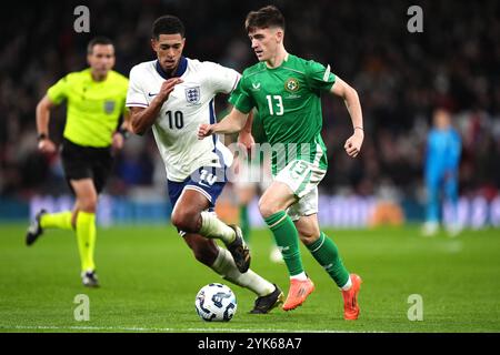 England's Jude Bellingham and Republic of Ireland's Andrew Moran battle for the ball during the UEFA Nations League Group B2 match at Wembley Stadium, London. Picture date: Sunday November 17, 2024. Stock Photo