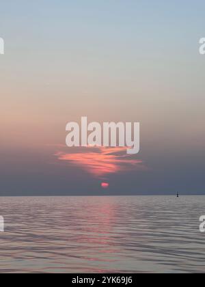 Beautiful sunset above the sea looks like a painting, Turkiye Stock Photo