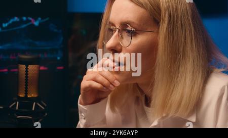 Caucasian anxious business woman girl businesswoman broker crypto trading hard work nervous female programmer stress difficult cyber security computer Stock Photo
