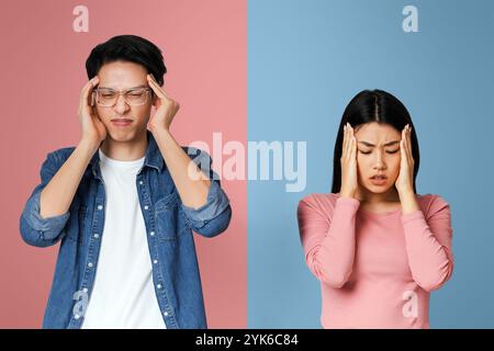 Asian sad couple having headache, touching their temples Stock Photo