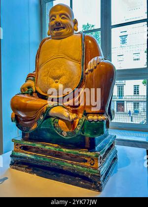 London, England, Detail, display inside, Ancient Chinese  Art Exhibit , Collection, The British Museum,  'Stoneware figure of Budai', (Buddhist Monk) Stock Photo