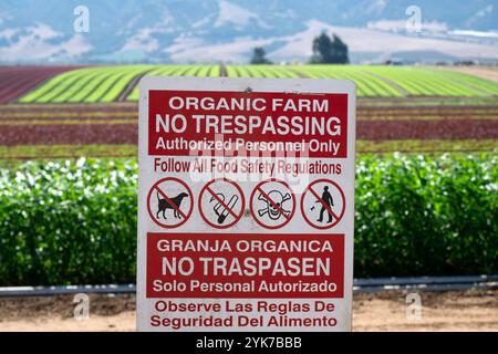 No trespassing sign with rules and regulations for organic farm crops in California Stock Photo