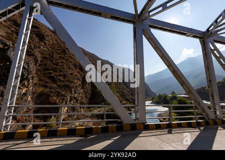 A bridge crossing Paro Chhu or Paro River, Paro – Thimphu highway, Bhutan. Stock Photo