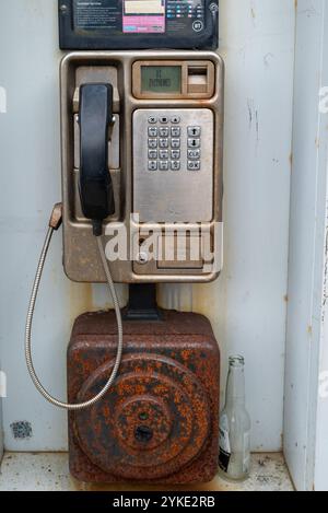 An old rusty BT pay phone on a street in England.  Portsmouth, November 2024. Stock Photo