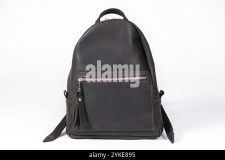 Leather women's backpack on a white background isolate. Leather bags and backpacks. Stock Photo