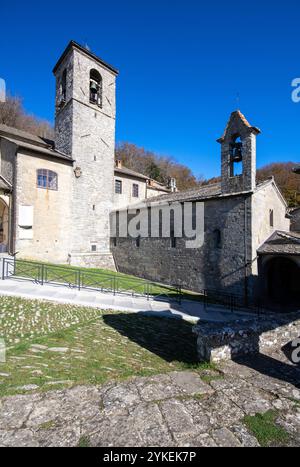 Main church bell tower (on the left) and chapel of Santa Maria degli Angeli (on the right), La Verna Sanctuary, Chiusi della Verna, Tuscany, Italy Stock Photo