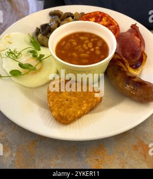 Traditional fried breakfast on white plate Stock Photo