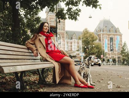 Portrait of a beautiful woman with dalmatian dog in Amsterdam Stock Photo