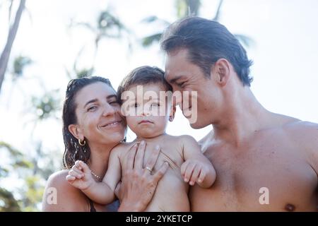 Happy Family on vacation with toddler in Maui Stock Photo