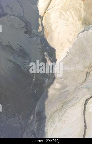 A mesmerizing aerial view of Riotinto, Huelva, capturing abstract forms created by natural elements The earthy tones and unique shapes provide a stunn Stock Photo