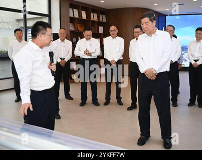 (241118) -- GUANGZHOU, Nov. 18, 2024 (Xinhua) -- Chinese Vice Premier He Lifeng, also a member of the Political Bureau of the Communist Party of China Central Committee, visits Nansha Port in Guangzhou, south China's Guangdong Province, Nov. 17, 2024. He has urged boosting port capacity to improve their ability to serve as logistics hubs and for ports to offer comprehensive services, while fostering coordinated regional port development. He made the remarks on Sunday during a research tour to Guangdong Province, where he visited Nansha Port in the city of Guangzhou and Shekou Port in the city Stock Photo