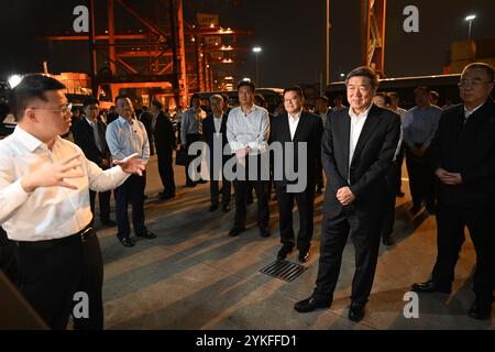 (241118) -- GUANGZHOU, Nov. 18, 2024 (Xinhua) -- Chinese Vice Premier He Lifeng, also a member of the Political Bureau of the Communist Party of China Central Committee, visits Shekou Port in Shenzhen, south China's Guangdong Province, Nov. 17, 2024. He has urged boosting port capacity to improve their ability to serve as logistics hubs and for ports to offer comprehensive services, while fostering coordinated regional port development. He made the remarks on Sunday during a research tour to Guangdong Province, where he visited Nansha Port in the city of Guangzhou and Shekou Port in the city o Stock Photo