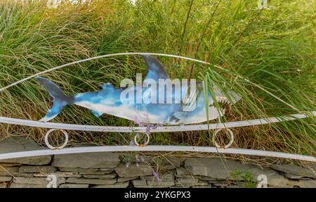 detail image of a shark on a wrought iron gate Stock Photo