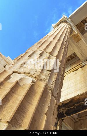 Details figures sculptures columns of the Acropolis of Athens with amazing and beautiful ruins Parthenon and blue cloudy sky in Greece's capital Athen Stock Photo