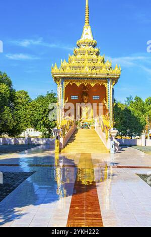 Golden Big Buddha statue in holy shrine in Wat Phadung Tham Phothi temple in Khao Lak Phang-nga Thailand Stock Photo