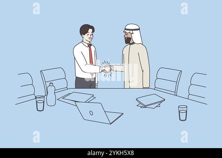 Multiracial business partners clients shake hand after successful meeting negotiation in office. Smiling multiethnic arab and Caucasian businessmen ha Stock Photo