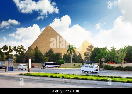 Ancient Great Pyramids and present day of Giza town,suburb of Cairo city. Egypt. Stock Photo