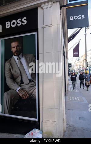 Hugo Boss advertising featuring David Beckham on Bond Street on 4th November 2024 in London, United Kingdom. Bond Street is one of the principal streets in the West End shopping district and is very upmarket. It has been a fashionable shopping street since the 18th century. The rich and wealthy shop here mostly for high end fashion and jewellery. Stock Photo