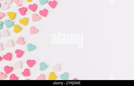Small, pastel colored hearts forming a decorative border on a clean white background. 3d rendering Stock Photo