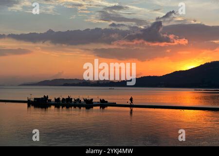 Sky in bright colors during a tropical sunset, Koh Samui, Thailand Stock Photo