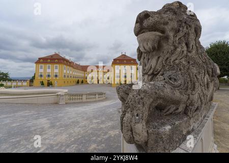 Engelhartstetten, Austria: Sculpture of a lion in the courtyard of the famous baroque Habsburger castle Schloss Hof Stock Photo