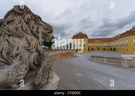 Engelhartstetten, Austria: Sculpture of a lion in the courtyard of the famous baroque Habsburger castle Schloss Hof which was owned b Stock Photo