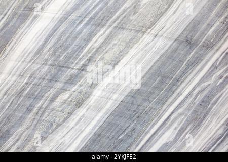 Marble surface, light gray and white, striped.  Natural pattern for design. Stock Photo