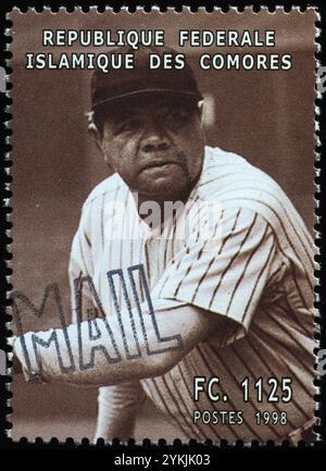 Vintage Portrait of baseball player Babe Ruth sitting in dugout wearing ...