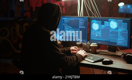 Hacker in underground bunker takes advantage of security breach after gaining unauthorized access to system. Rogue programmer hacking network to steal government data, zoom in close up shot Stock Photo