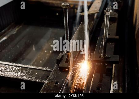 Working plasma cutter with water cooling. Stock Photo